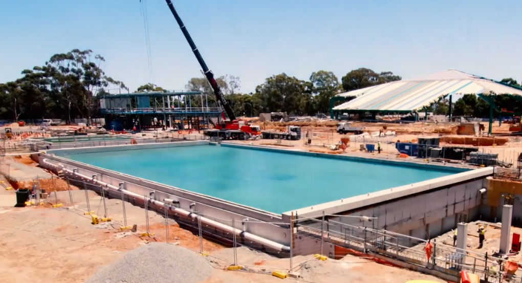 Construction of the new Aquatic Centre with the 50m pool full of water